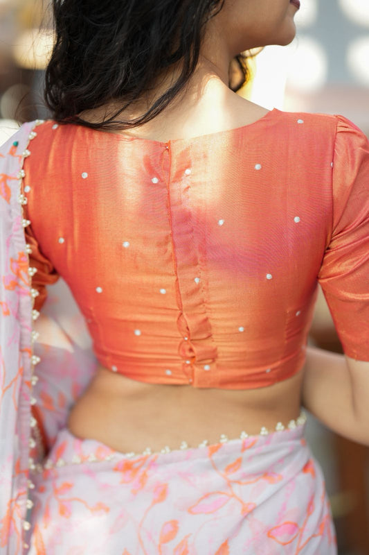 Reddish orange tissue floral hand work blouse(only blouse)