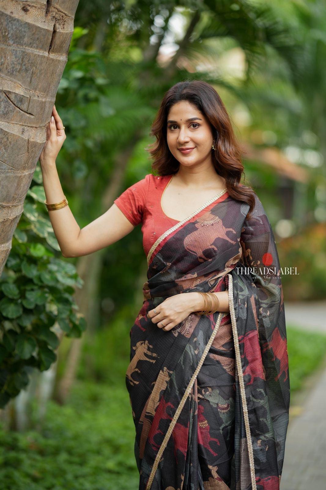 Black cow kota saree with paisley hand work blouse