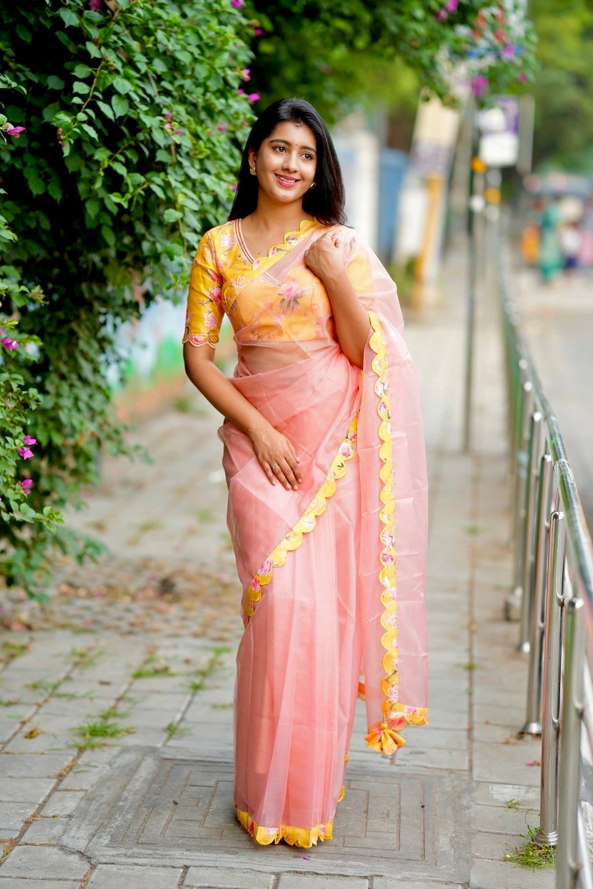 Peach organza saree with yellow floral hand work blouse