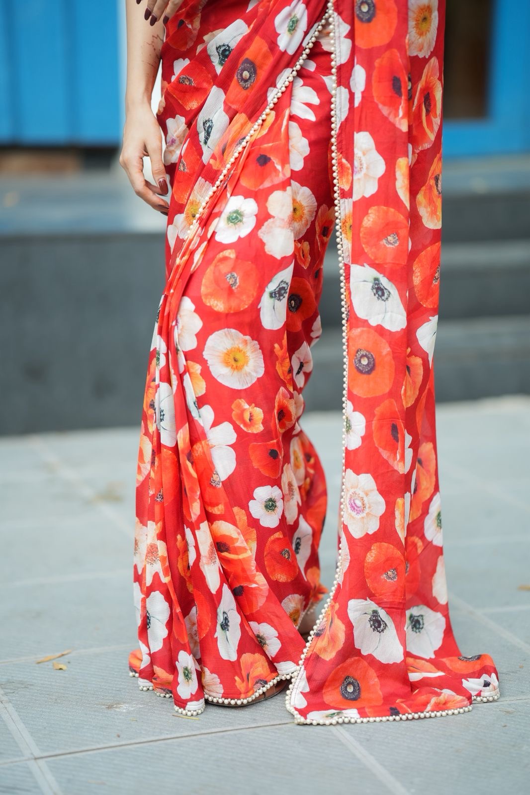 Orange red chinnon silk saree with white organza blouse