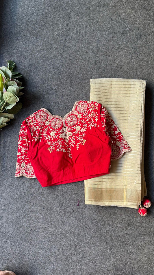 Cream tissue stripped saree with red silk hand work blouse