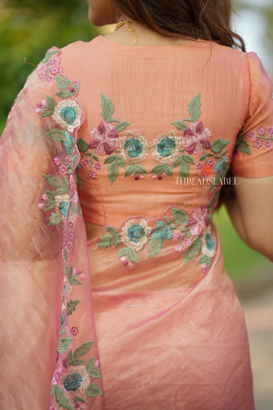 Peach soft tissue saree with embroidery blouse