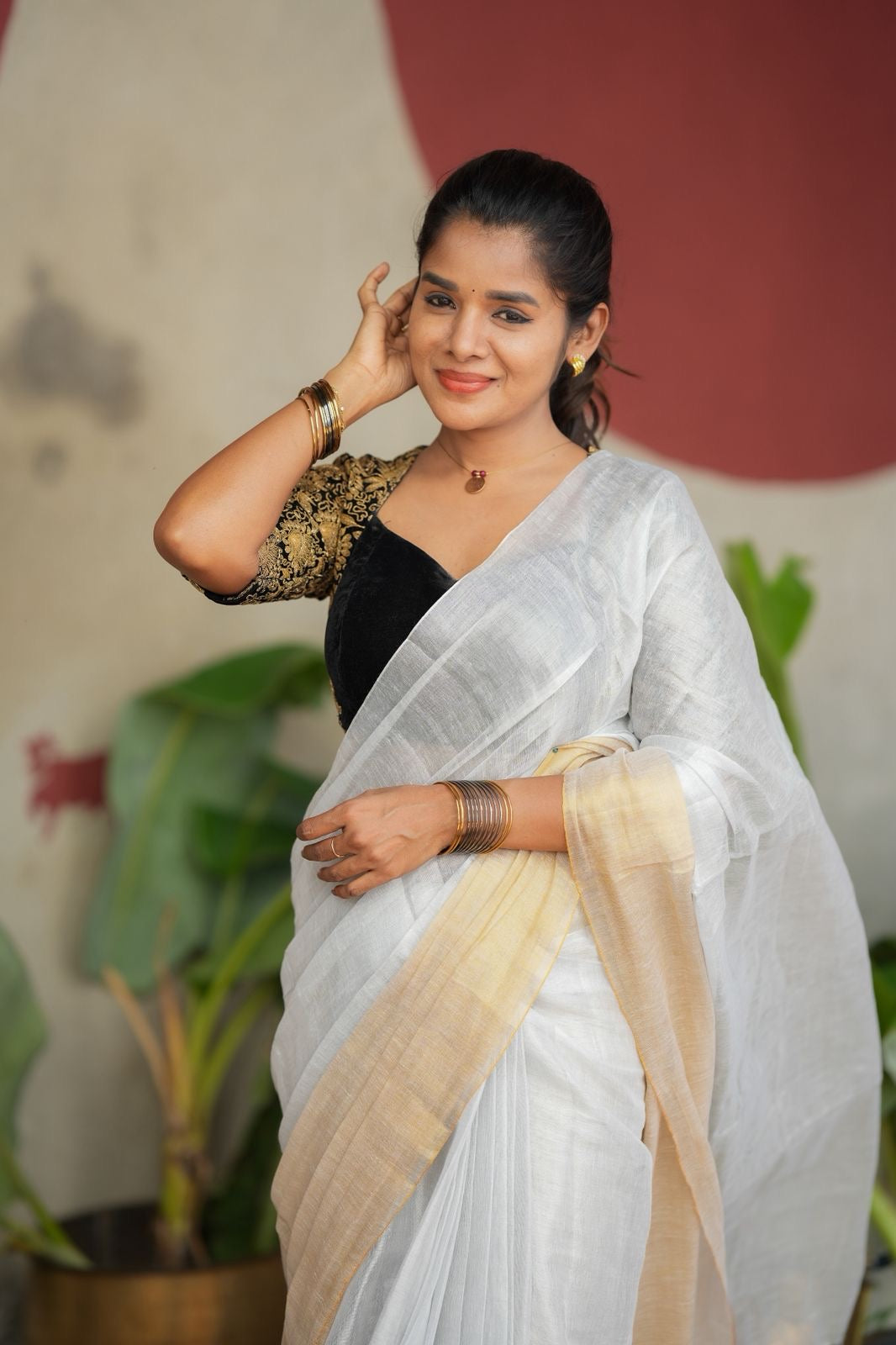 White soft tissue saree with heavy embroidery blouse