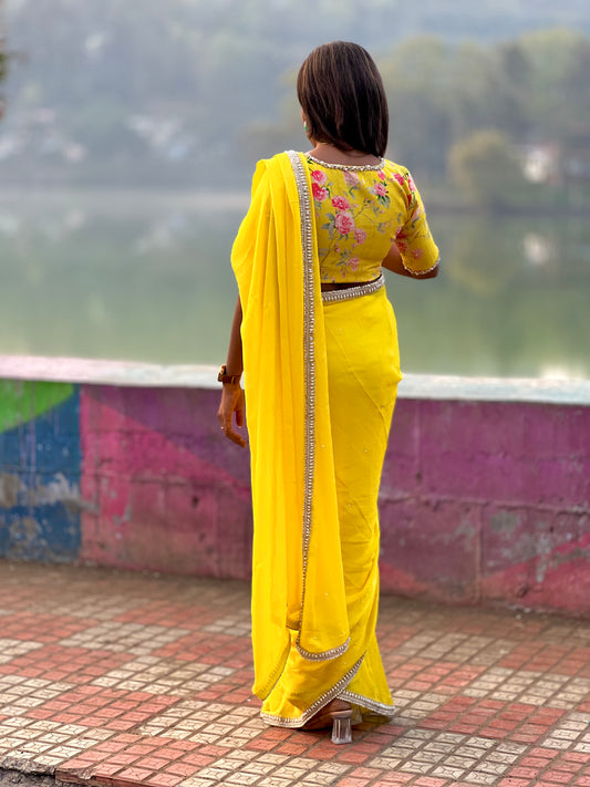 Yellow jute saree with pearl hand worked blouse
