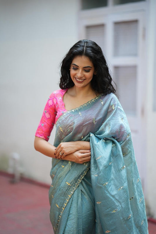 Sea blue tissue mirror work saree with ikkat blouse