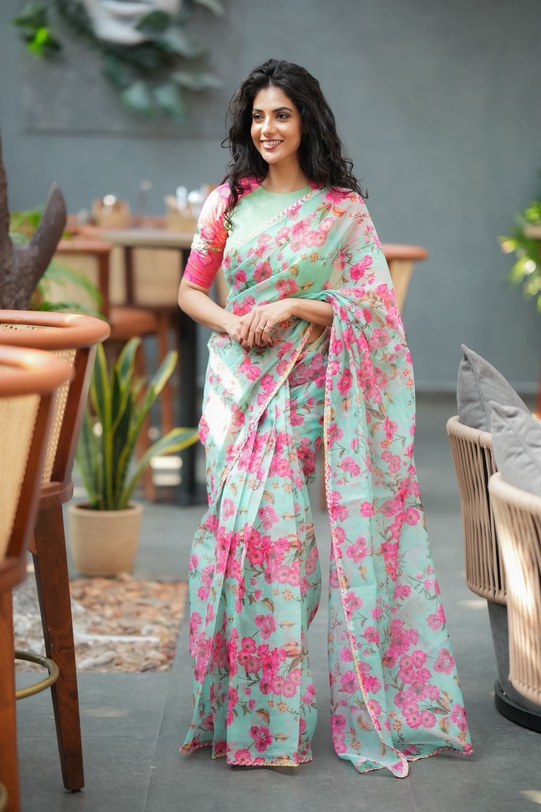 Pista floral organza saree with hand work blouse