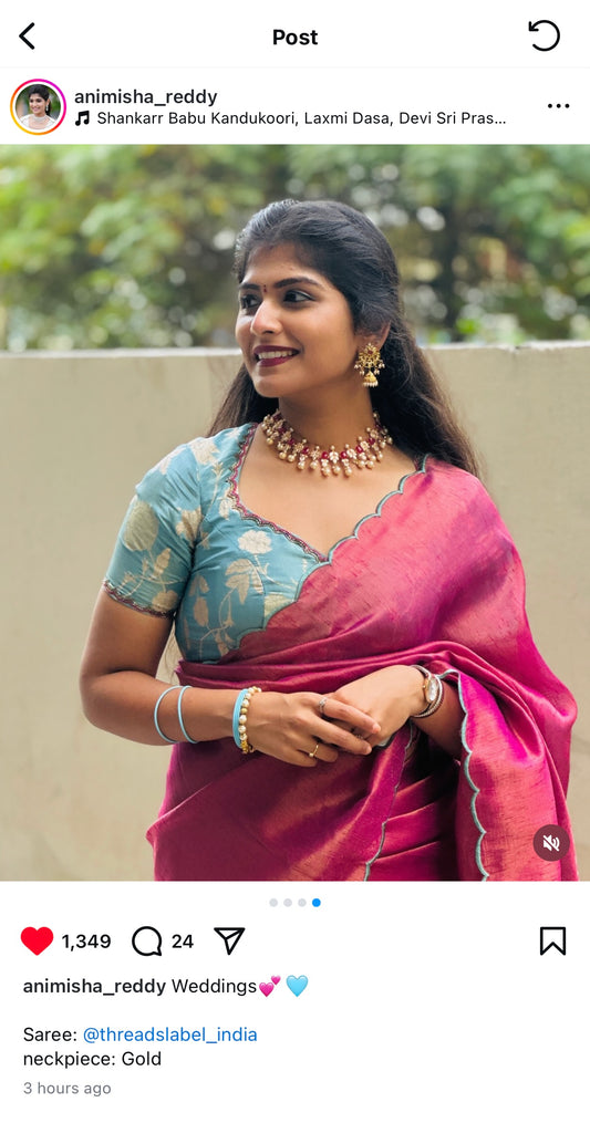 Pink soft tissue saree with blue hand worked blouse