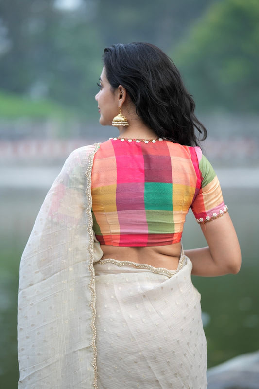 Beige georgette tissue saree with multi hand work blouse