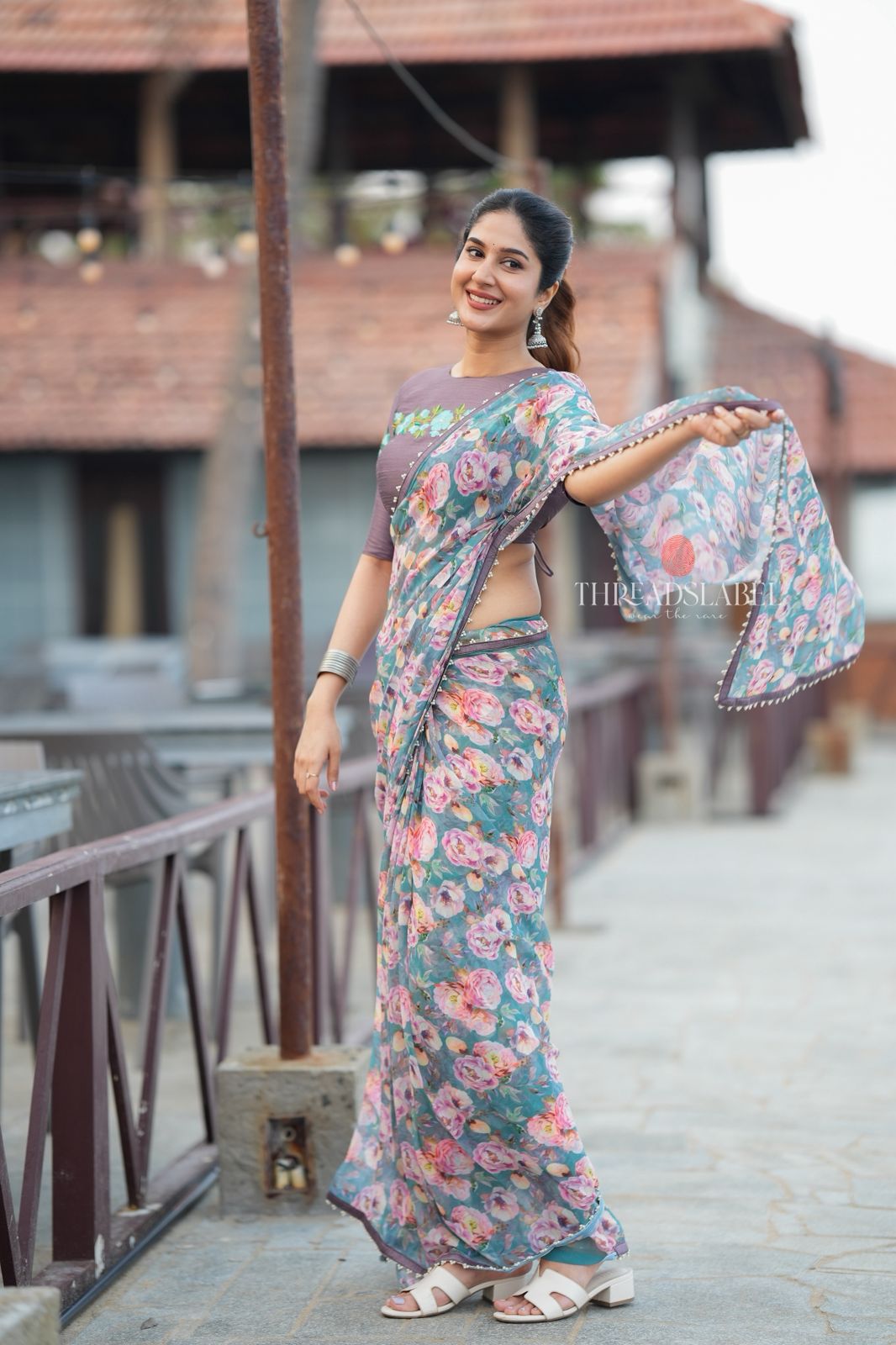 Blue floral georgette saree with grey embroidery blouse