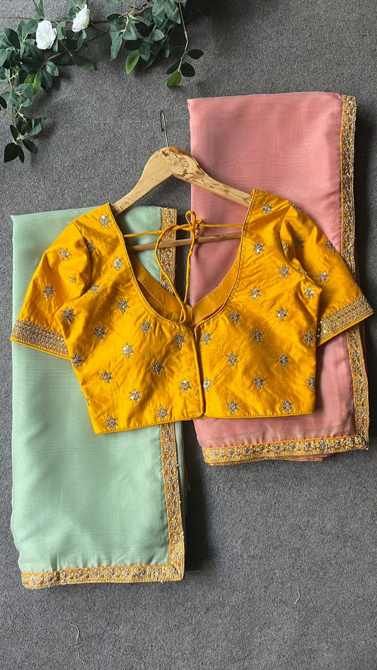 Mint organza saree with yellow embroidery blouse