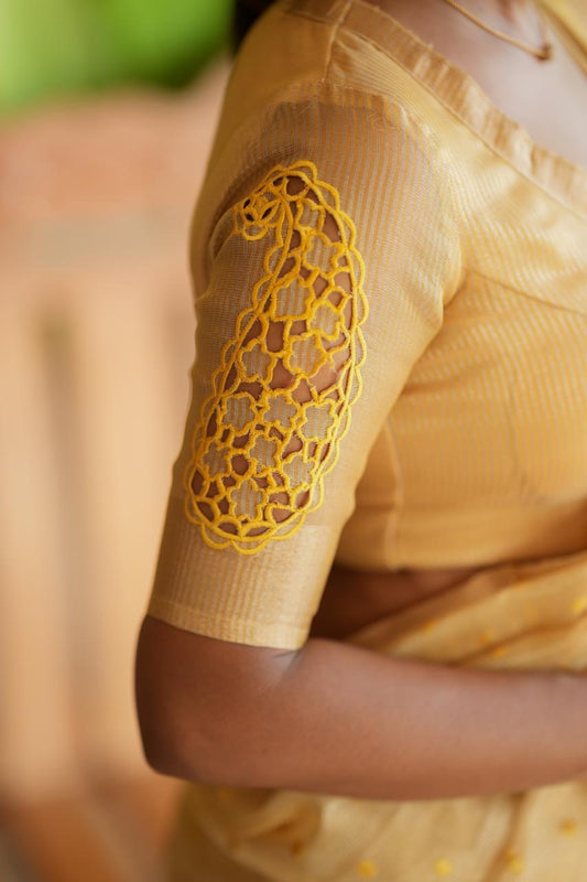 Gold kota doria saree with hand work blouse