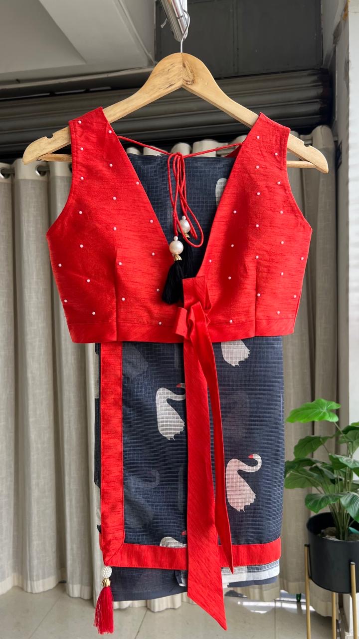 Grey kota doria saree with reddish hand worked blouse