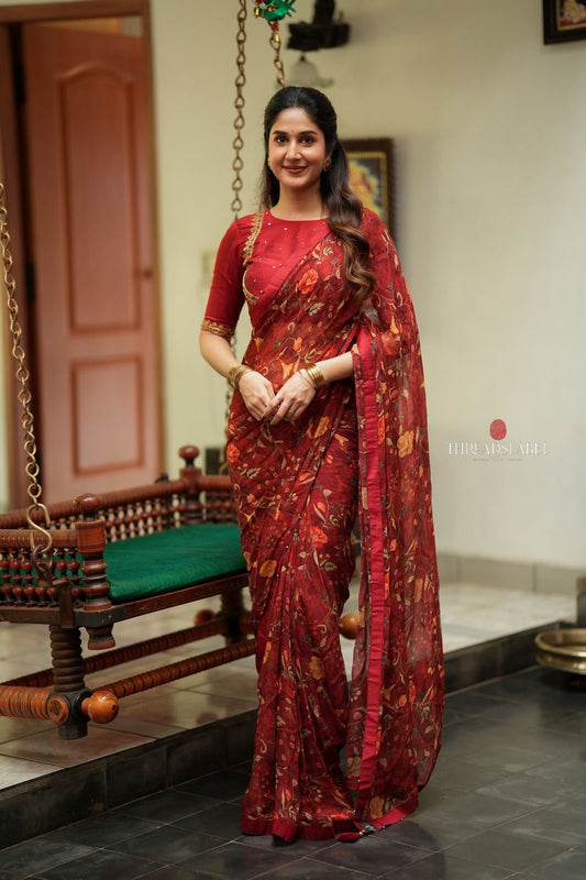 Maroon chiffon floral saree with hand work blouse