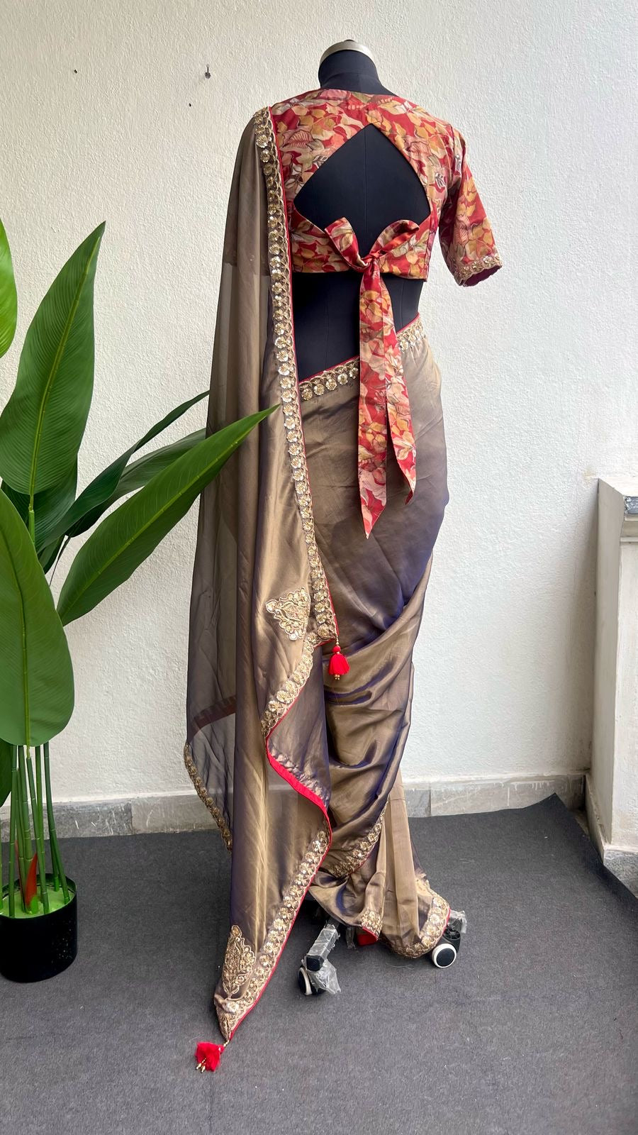 Grey soft tissue saree with floral embroidery blouse