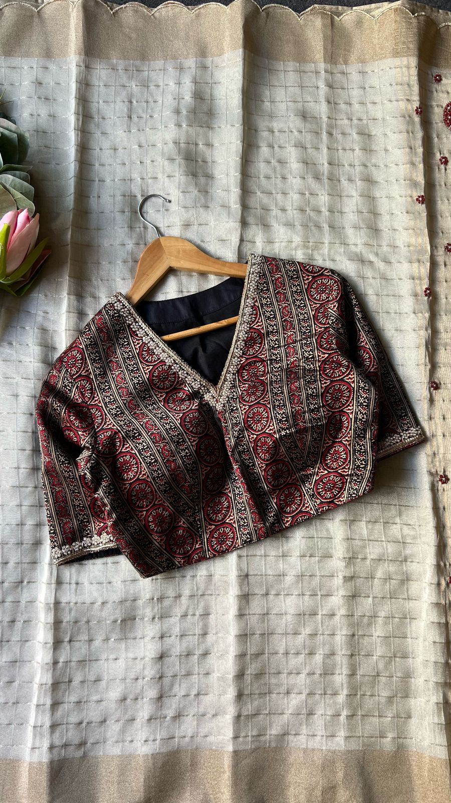 Cream checked tissue saree with Ajrak hand worked blouse