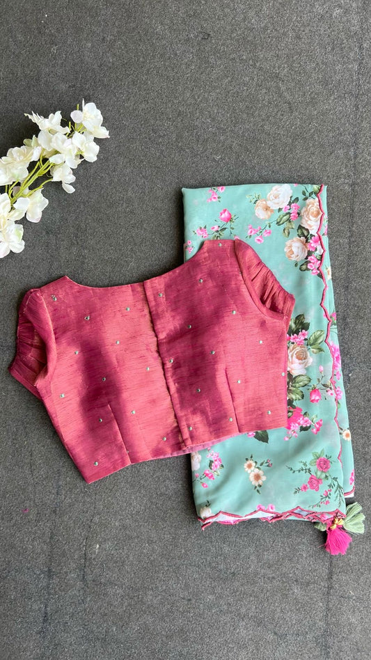 Blue floral georgette saree with pink embroidery blouse