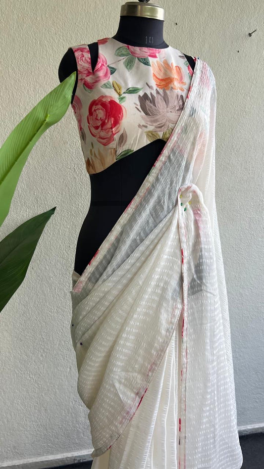 White chiffon saree with floral blouse