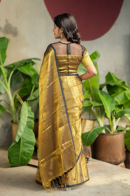 Golden soft tissue saree with hand work blouse
