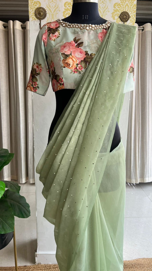Light green tissue saree with mirror floral blouse