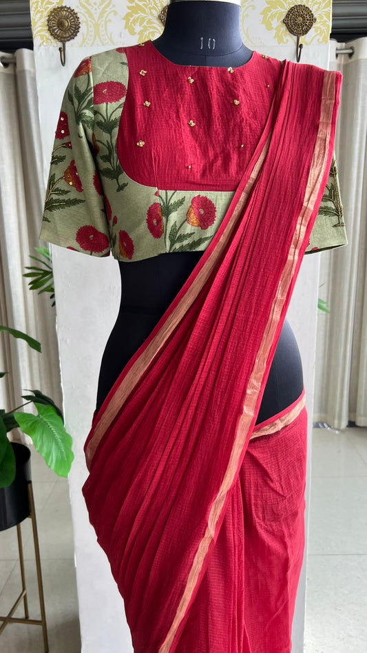 Maroon pure kota saree with green hand work blouse