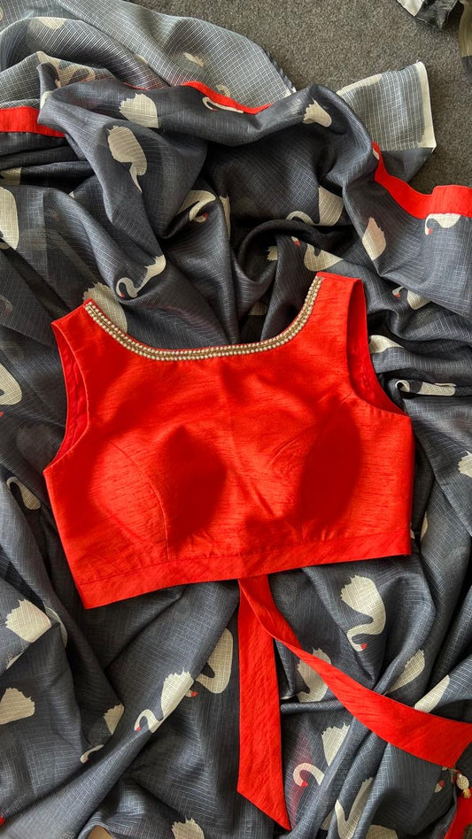 Grey kota doria saree with reddish hand worked blouse