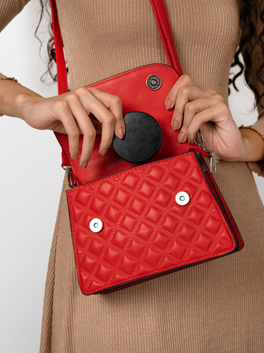 Women red textured fashion bag