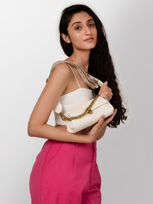 Women white textured hand bag