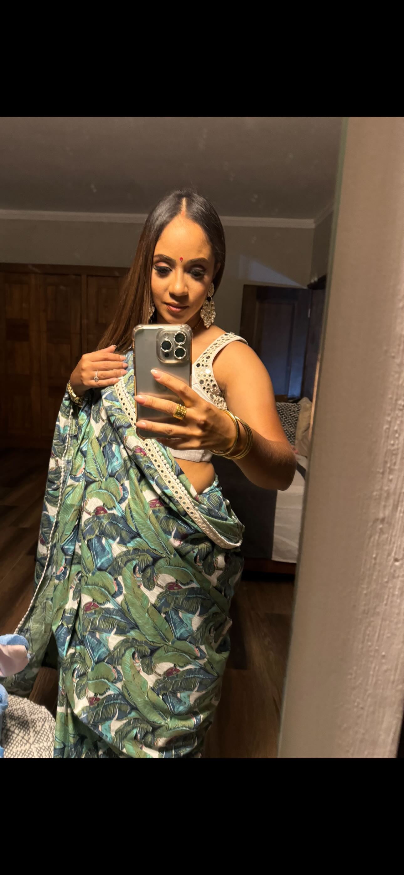 Green floral cotton saree with mirror worked blouse