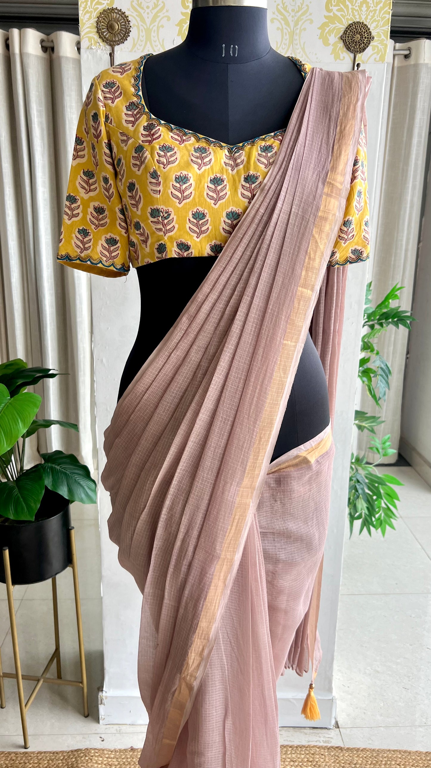 Light peach mul kota saree with yellow hand work blouse