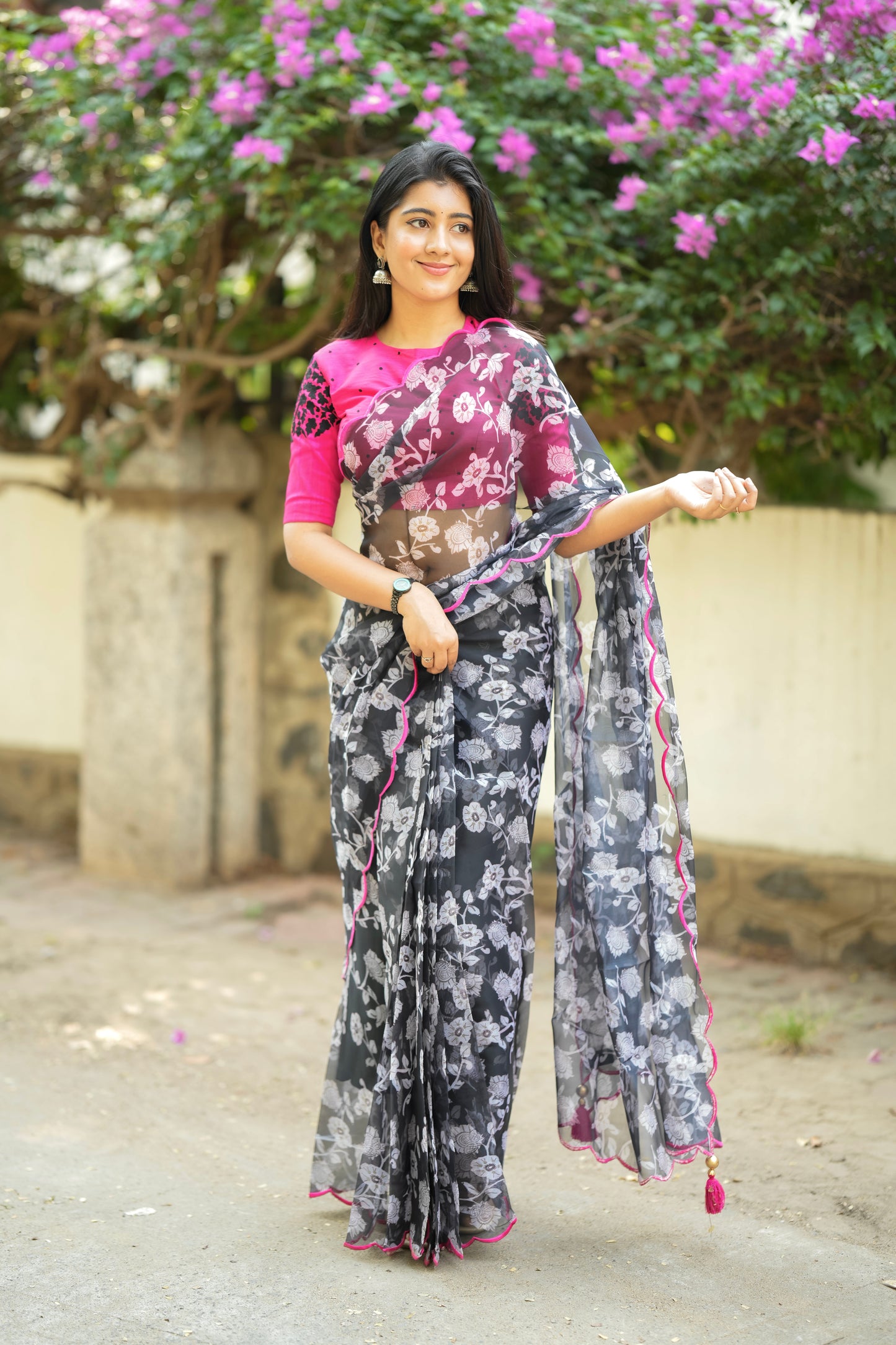 Black floral organza saree with pink embroidery blouse