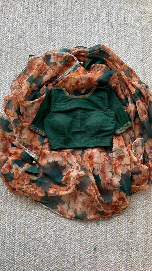 Bottle green floral organza saree with hand worked blouse