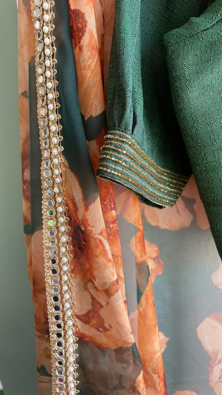 Bottle green floral organza saree with hand worked blouse