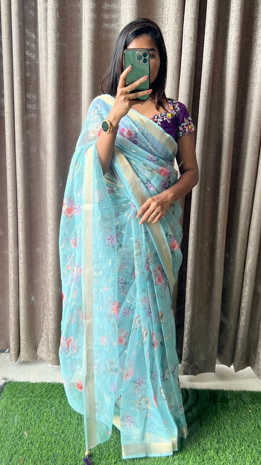 Blue organza saree with purple handwork blouse