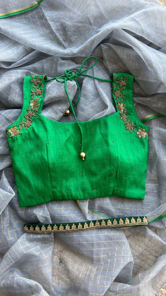 Grey organza saree with green hand work blouse