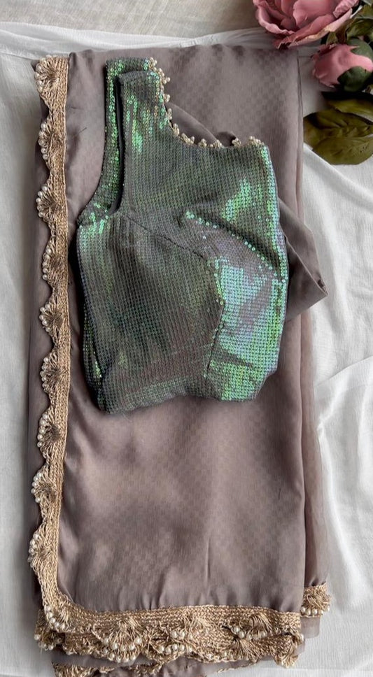 Grey georgette saree with sequins blouse