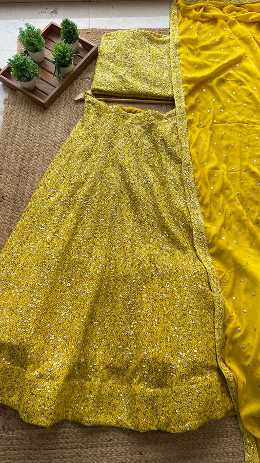 Yellow heavy sequence embroidered ethnic lehenga