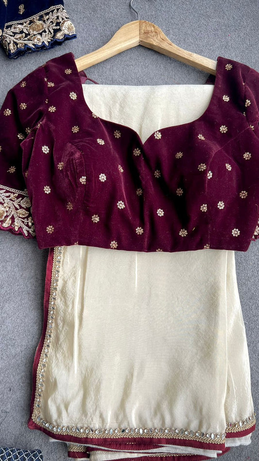 Gold tissue saree with velvet embroidery blouse