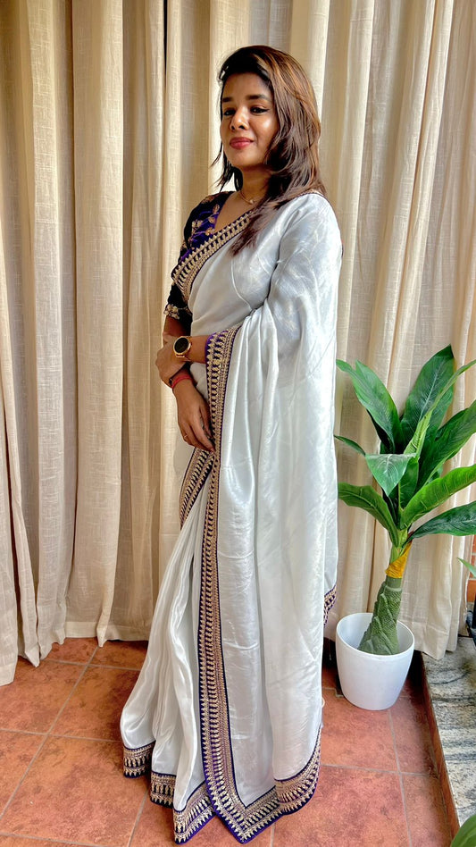 Silver silk saree with purple hand work blouse