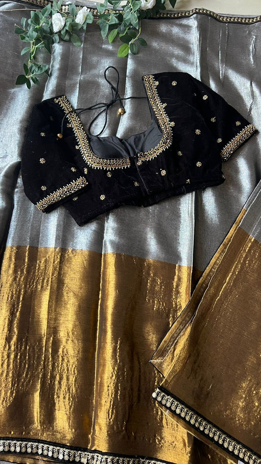 Silver tissue saree with black velvet hand worked blouse