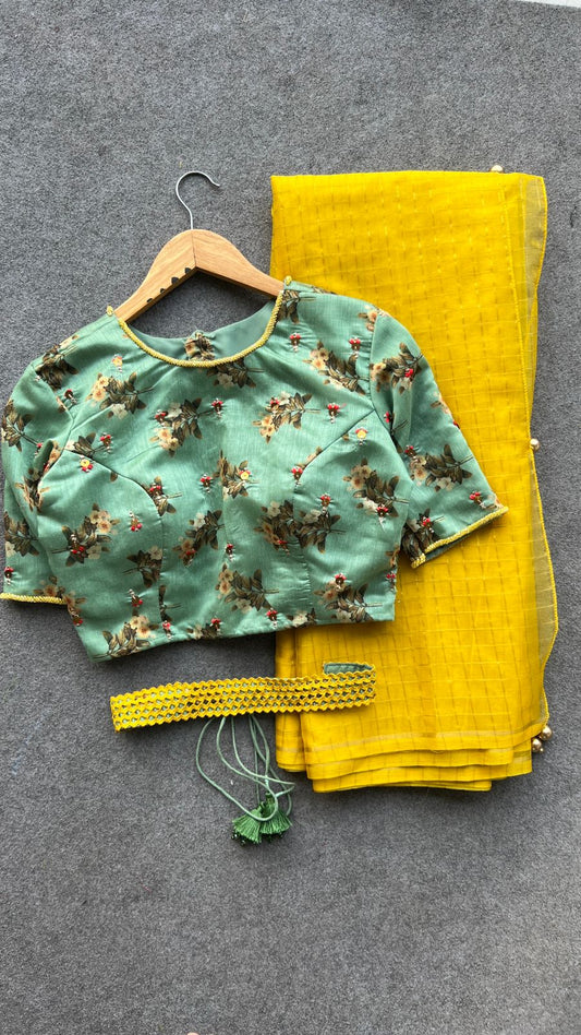 Yellow checked organza saree with hand work blouse