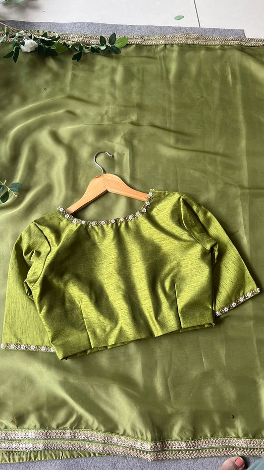 Green soft organza saree with hand worked blouse