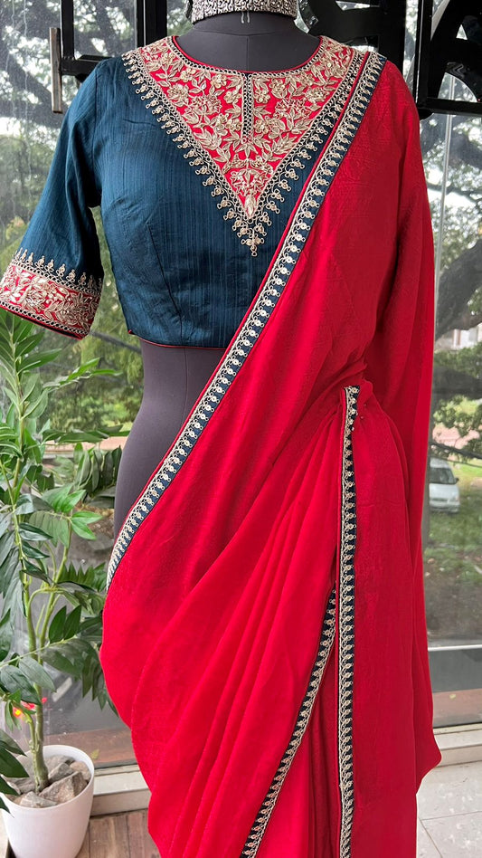 Red textured silk saree with heavy embroidery blouse