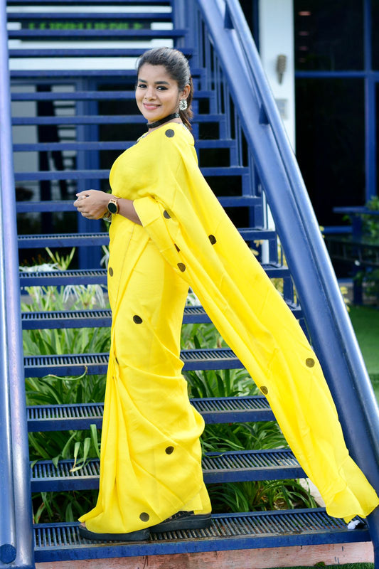 yellow jute polka dots saree with hand embroidered blouse