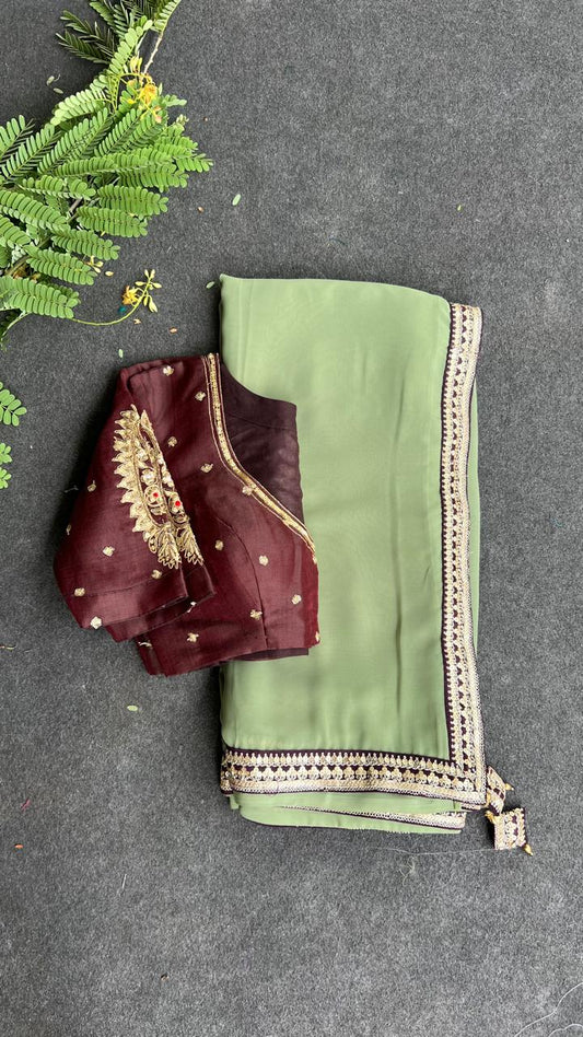 Apple green georgette saree with brown paisley handmade blouse