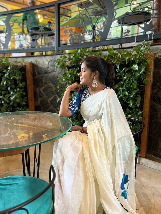 White jute saree with blue embroidery handmade blouse