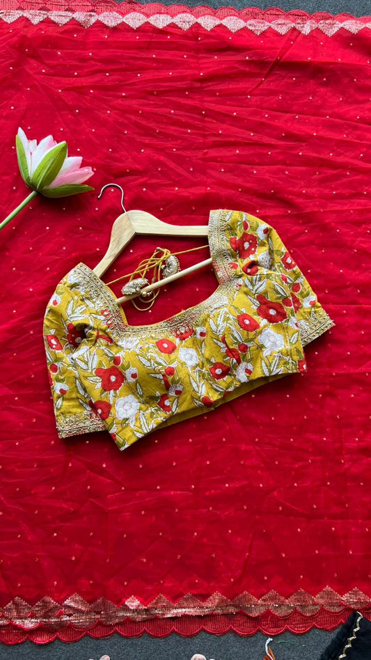 Red organza saree with cotton hand worked blouse