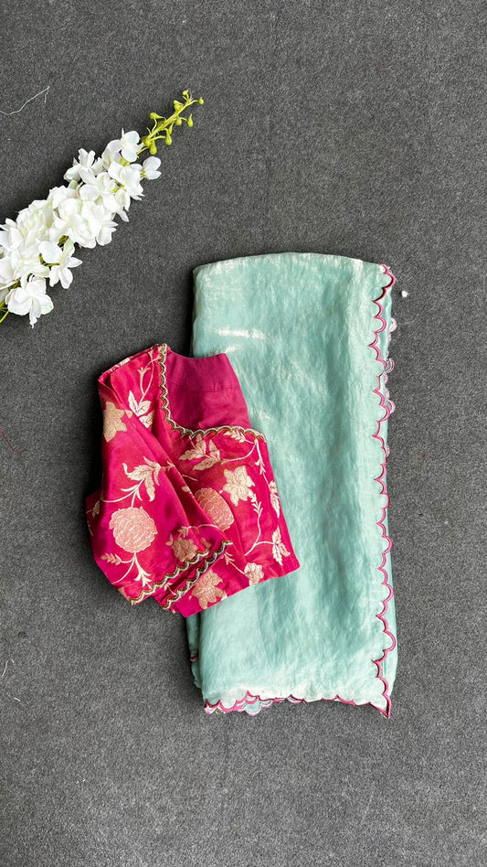 Sea blue glass tissue saree with pink hand worked blouse in