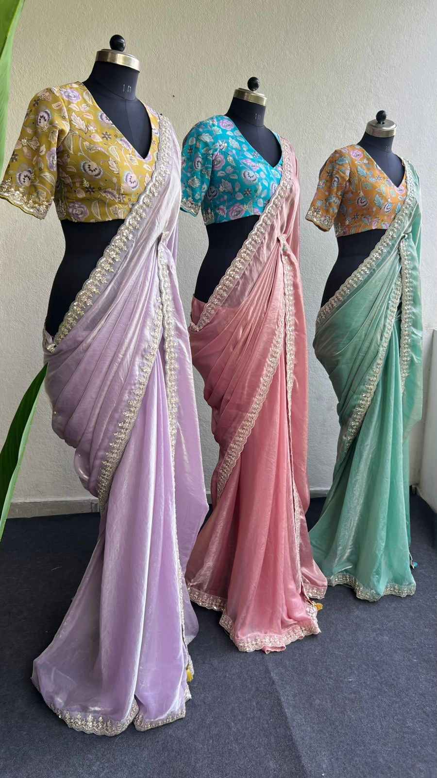 Peach soft tissue saree with cyan blue floral blouse