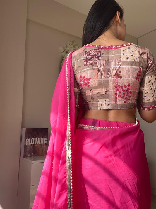 Pink soft organza saree with pearl hand work blouse