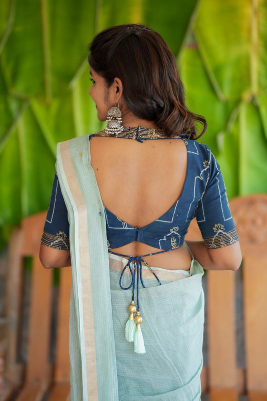 Aqua blue kota doria saree with hand work blouse